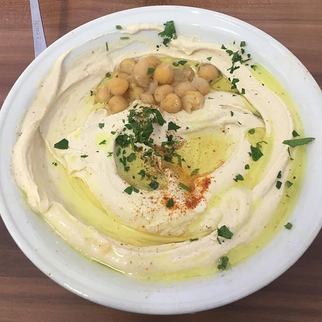 Livin that hummus life at one of the best Hummus spots on the planet: Abu Hassan. I'm living in this bowl for a while: Hummus, tahini, paprika, oil and heaven. "
"
"